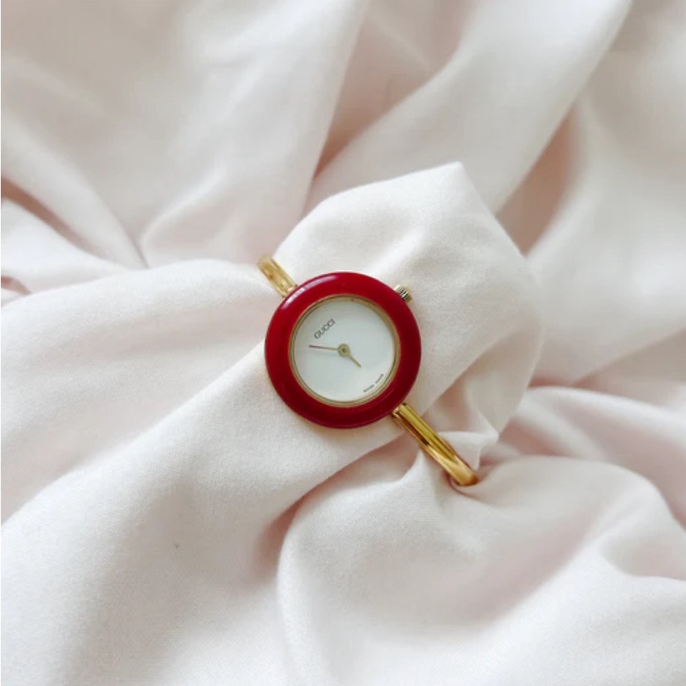 Gucci Red and Gold Timepiece